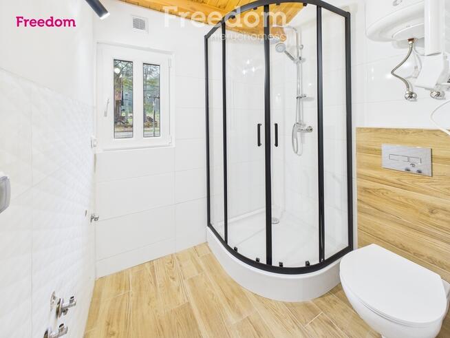 Nowoczesny dom z tarasem w ośrodku nad jeziorem