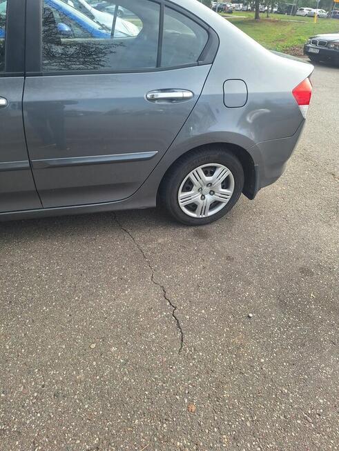 Sprzedam honda city 1.4 b 100km .