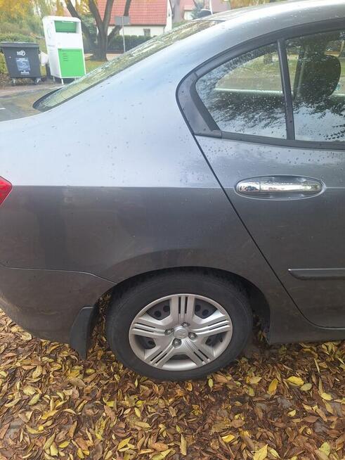 Sprzedam honda city 1.4 b 100km .
