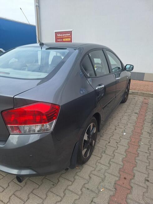 Sprzedam honda city 1.4 b 100km .