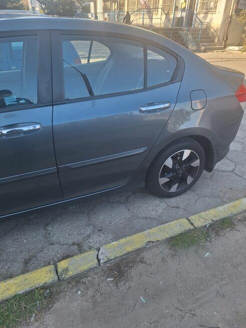 Sprzedam honda city 1.4 b 100km .