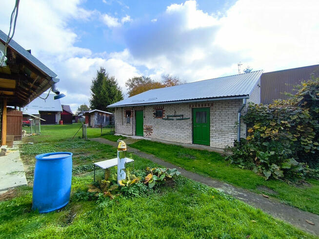 Dom drewniany z budynkami gospodarczymi – Kuryłówka