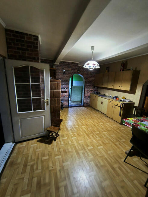 Dom drewniany z budynkami gospodarczymi – Kuryłówka