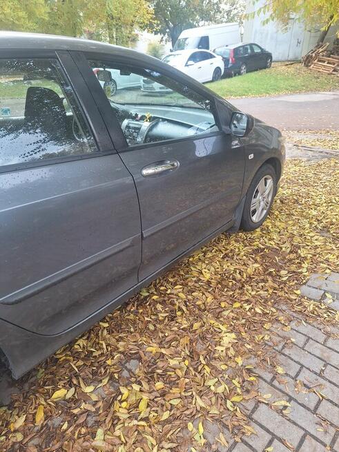 Sprzedam honda city 1.4 b 100km .