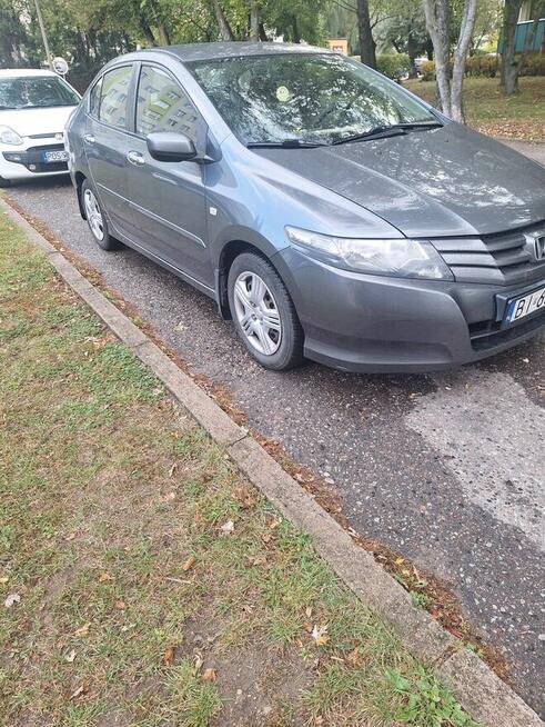 Sprzedam honda city 1.4 b 100km .