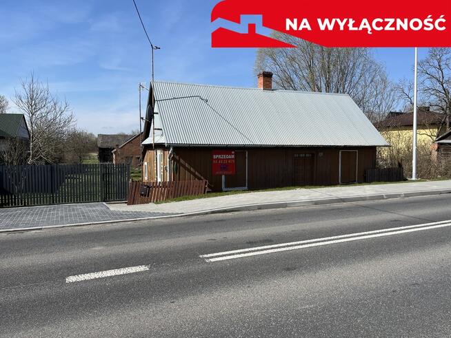 Drewniany dom na działce w Świeciechowie Dużym.