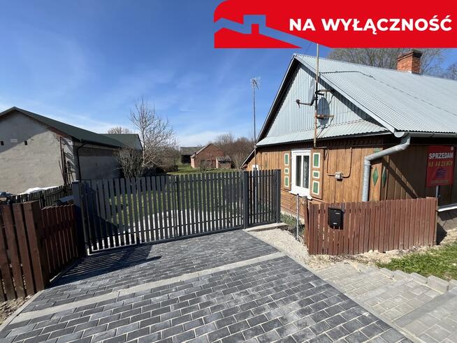 Drewniany dom na działce w Świeciechowie Dużym.