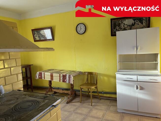 Drewniany dom na działce w Świeciechowie Dużym.