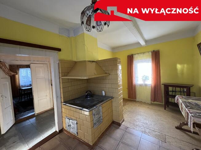 Drewniany dom na działce w Świeciechowie Dużym.