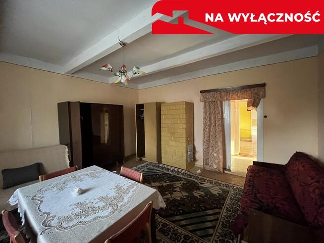 Drewniany dom na działce w Świeciechowie Dużym.