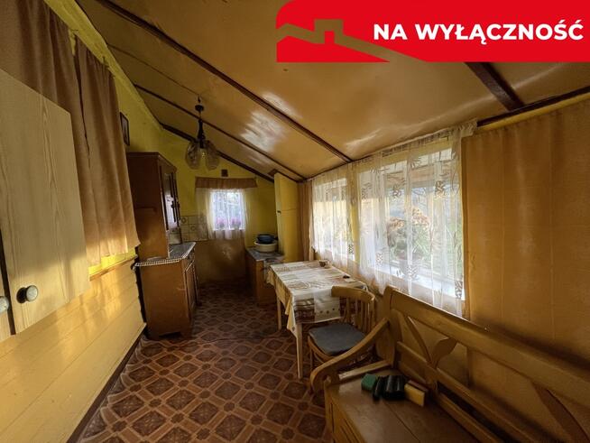 Drewniany dom na działce w Świeciechowie Dużym.