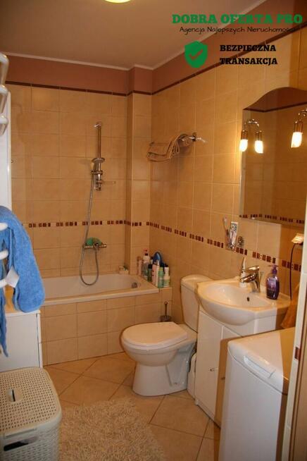 2-pokojowe mieszkanie z halą garażową i komórką