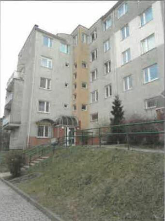 Syndyk sprzeda 2-kondygnacyjne mieszkanie z piwnicą