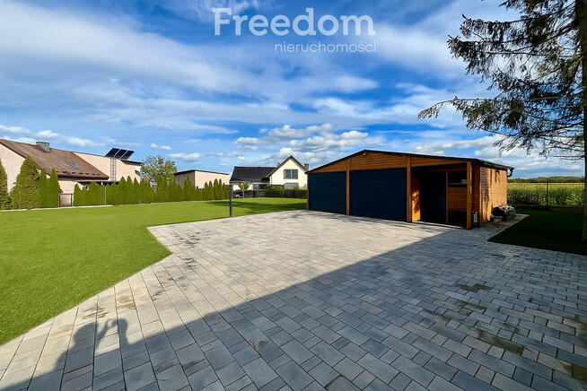 Nowoczesny smart dom z ogrodem zimowym