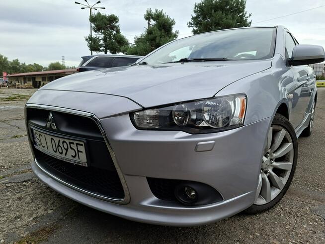 Mitsubishi Lancer Klimatronic, Podgrzewane fotele, Hak holowniczy, Czujniki parkowania