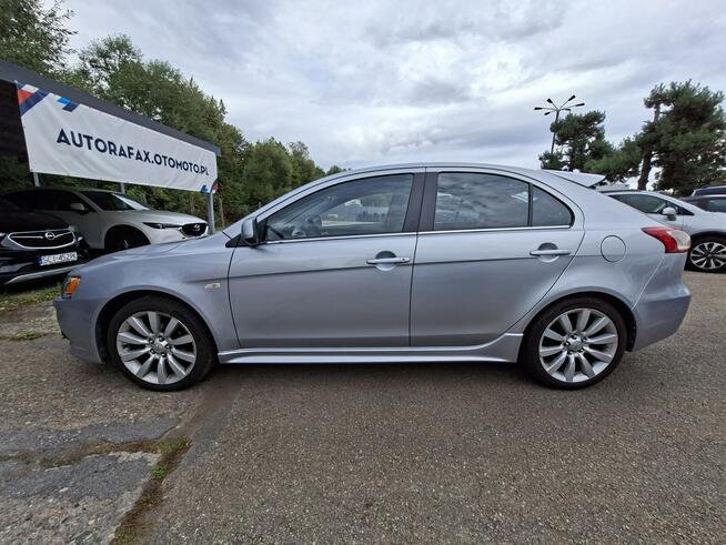 Mitsubishi Lancer Klimatronic, Podgrzewane fotele, Hak holowniczy, Czujniki parkowania