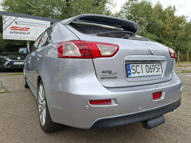 Mitsubishi Lancer Klimatronic, Podgrzewane fotele, Hak holowniczy, Czujniki parkowania