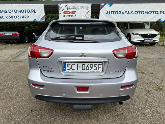 Mitsubishi Lancer Klimatronic, Podgrzewane fotele, Hak holowniczy, Czujniki parkowania