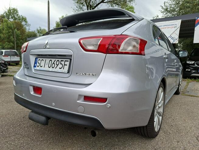 Mitsubishi Lancer Klimatronic, Podgrzewane fotele, Hak holowniczy, Czujniki parkowania