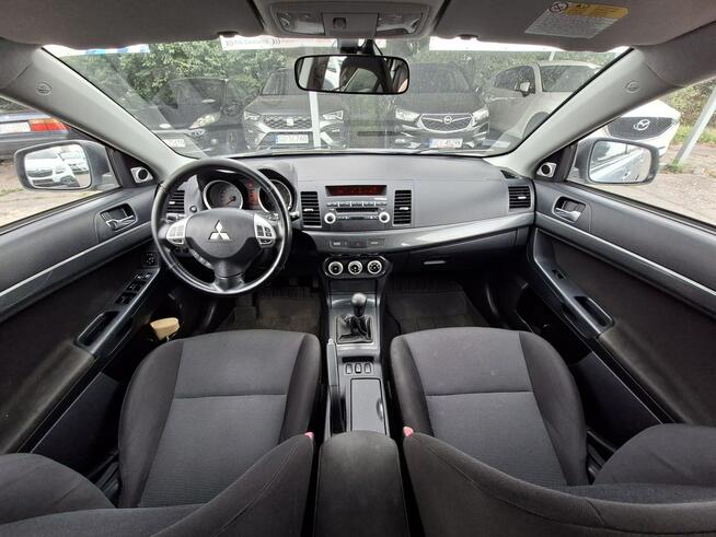 Mitsubishi Lancer Klimatronic, Podgrzewane fotele, Hak holowniczy, Czujniki parkowania