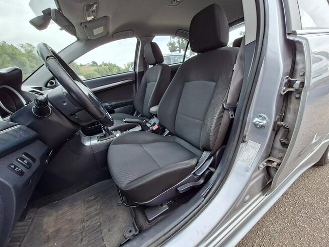 Mitsubishi Lancer Klimatronic, Podgrzewane fotele, Hak holowniczy, Czujniki parkowania
