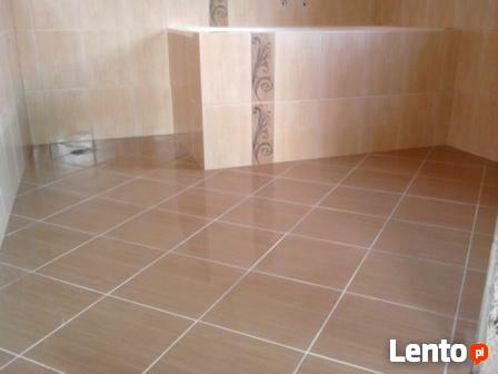 Oferuję układanie łazienek: kamień, gres, terakota.