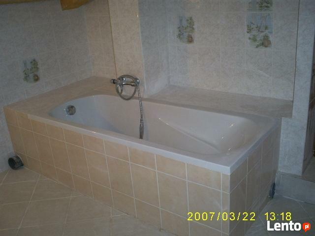 Oferuję układanie łazienek: kamień, gres, terakota.