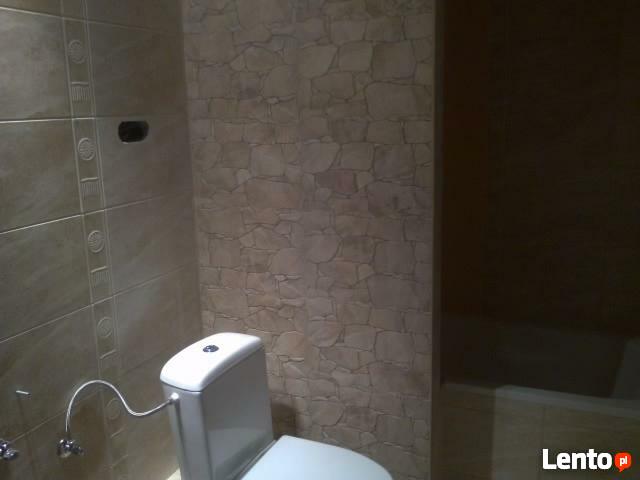 Oferuję układanie łazienek: kamień, gres, terakota.