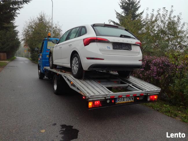 Pomoc drogowa autoholowanie laweta transport