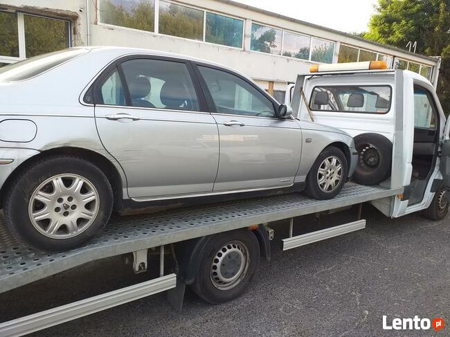 Laweta holowanie pomoc drogowa 24h