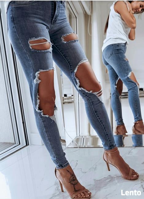 Jeansy z dziurami XS
