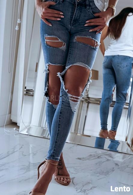 Jeansy z dziurami XS
