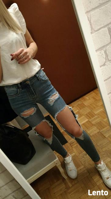 Jeansy z dziurami XS