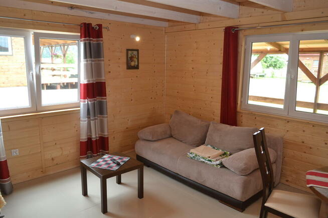 Domki Pionat Ryn Rybical Mazury jezioro noclegi wakacje