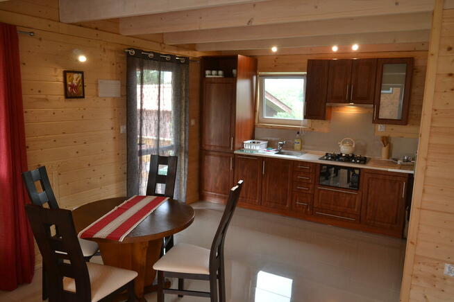 Domki Pionat Ryn Rybical Mazury jezioro noclegi wakacje