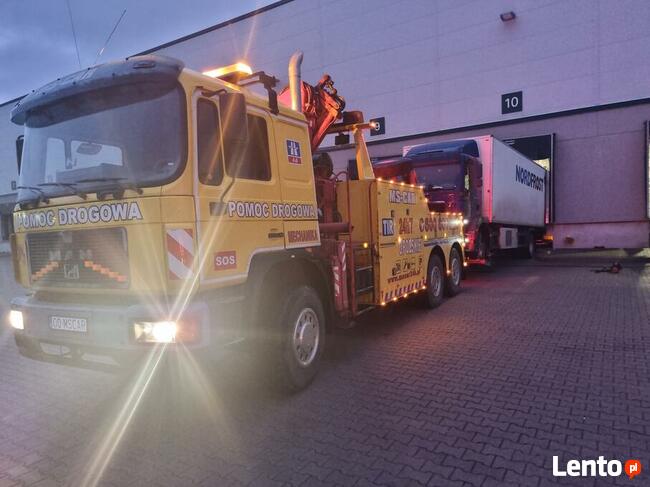 TRANSPORT NISKOPODWOZIOWY JEŁOWA POMOC DROGOWA HOLOWNIK