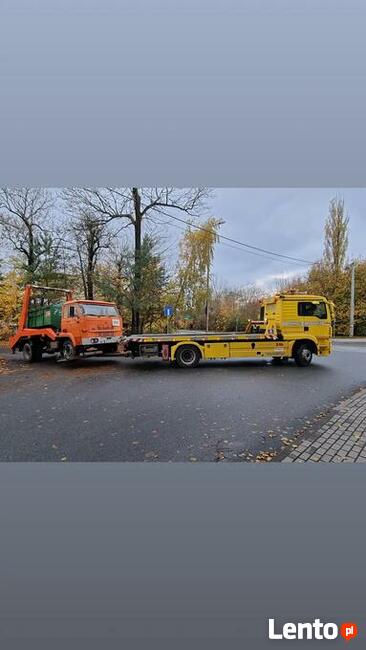 TRANSPORT NISKOPODWOZIOWY JEŁOWA POMOC DROGOWA HOLOWNIK