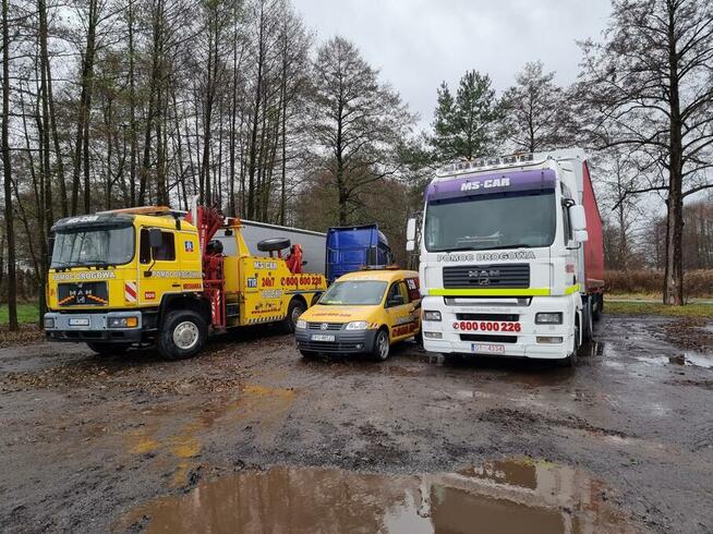 TRANSPORT NISKOPODWOZIOWY JEŁOWA POMOC DROGOWA HOLOWNIK