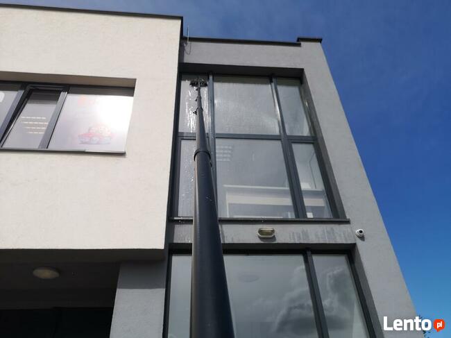 Wysokościowe mycie okien, witryn, fasad i przeszkleń