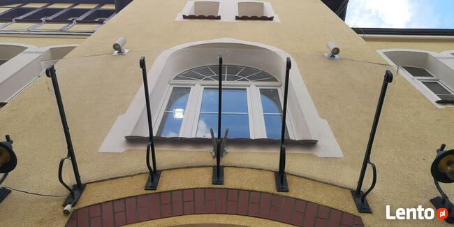 Wysokościowe mycie okien, witryn, fasad i przeszkleń