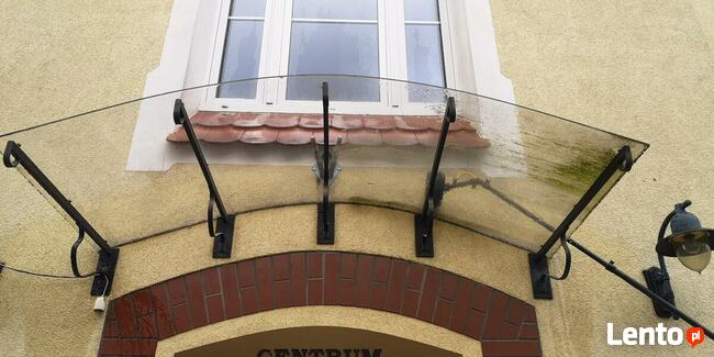 Wysokościowe mycie okien, witryn, fasad i przeszkleń