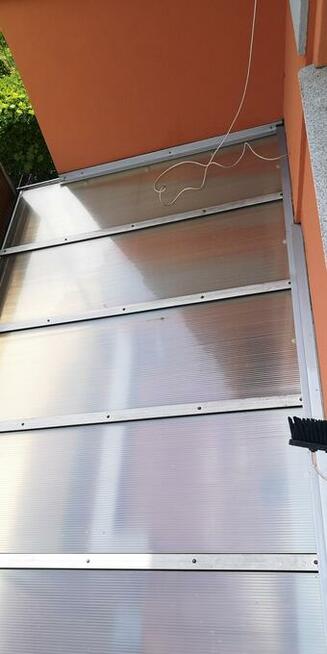 Wysokościowe mycie okien, witryn, fasad i przeszkleń