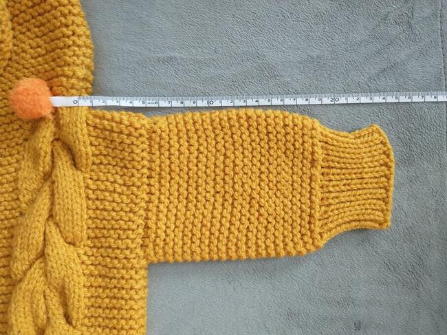 Ręcznie robiony kombinezon niemowlęcy z kapturem - słoneczko