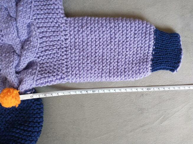 Ręcznie robiony kombinezon niemowlęcy z kapturem - buka