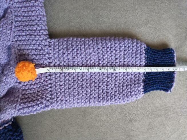 Ręcznie robiony kombinezon niemowlęcy z kapturem - buka