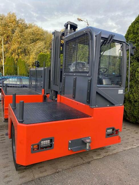 wielokierunkowy wózek widłowy boczny używany z podporami -