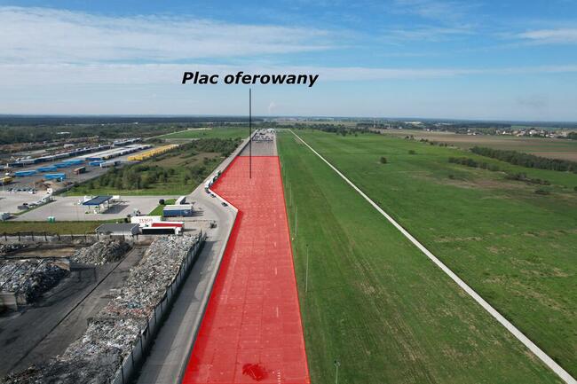 Teren przy A4, ogrodzony, wybetonowany, oświetlony 1,8 ha