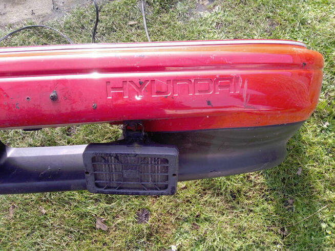 Zderzak przedni przód Hyundai Elantra 1991 halogen