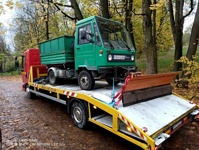 Holowanie Transport samochodów maszyn