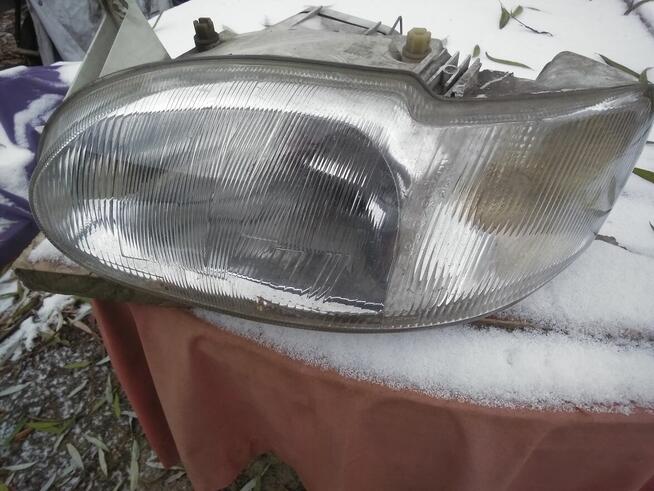 Lampa lewy przód Ford Escort MK VII